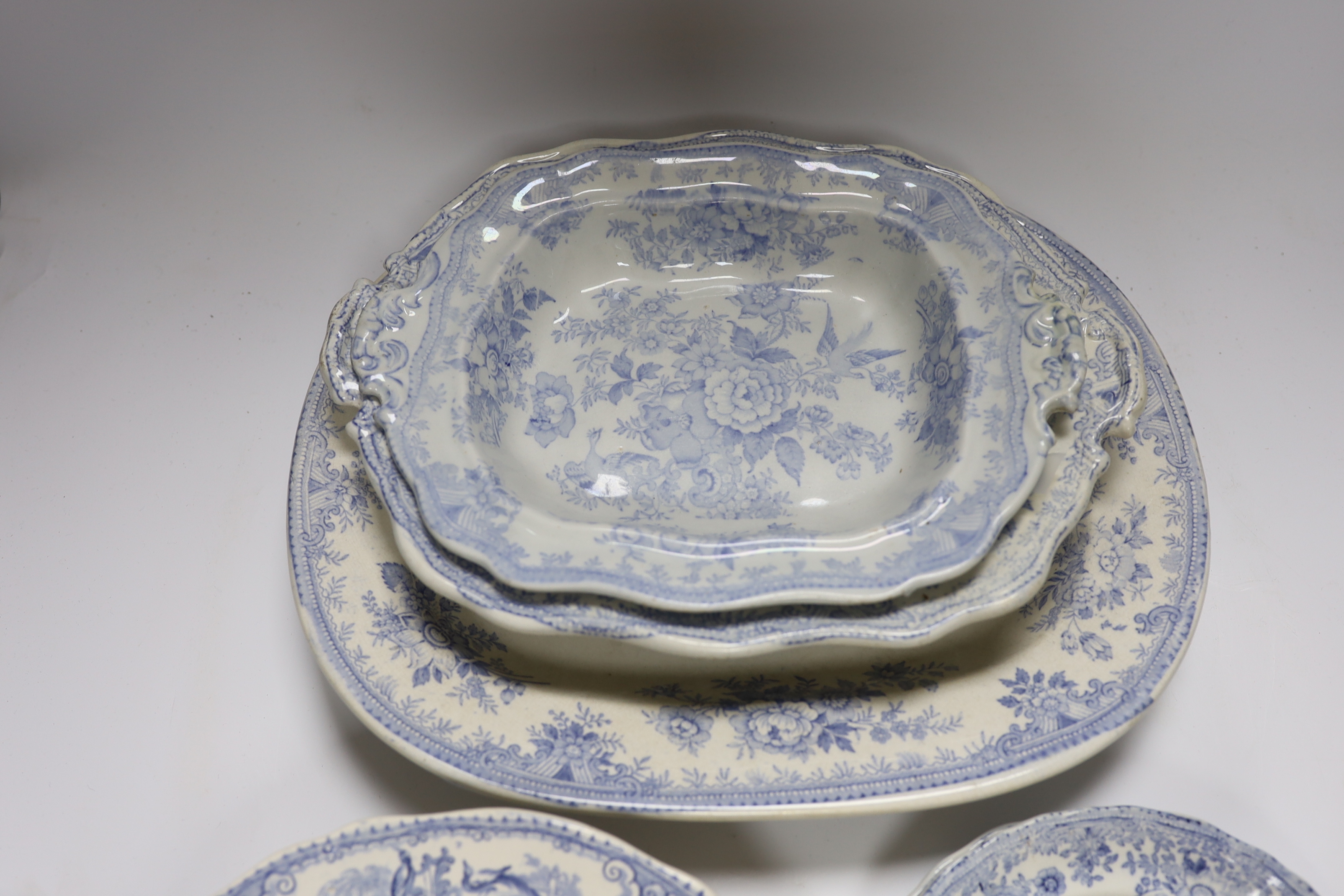 A collection of 19th century Staffordshire pottery blue and white dinner wares, (10 dishes in various sizes).